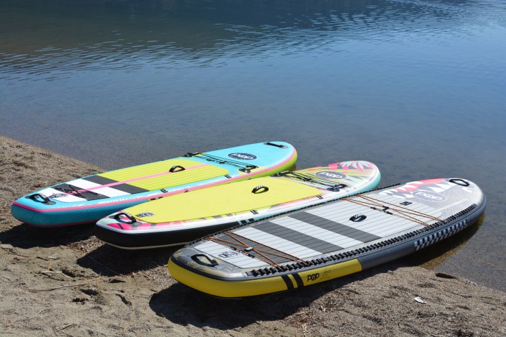 a boat sitting on top of a beach