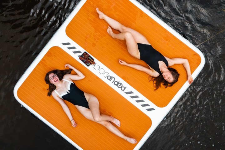 a stack of flyers on a table