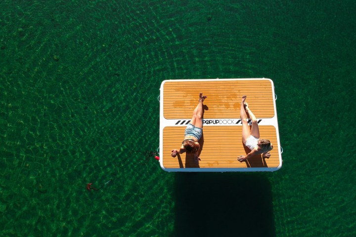 a close up of a green bench