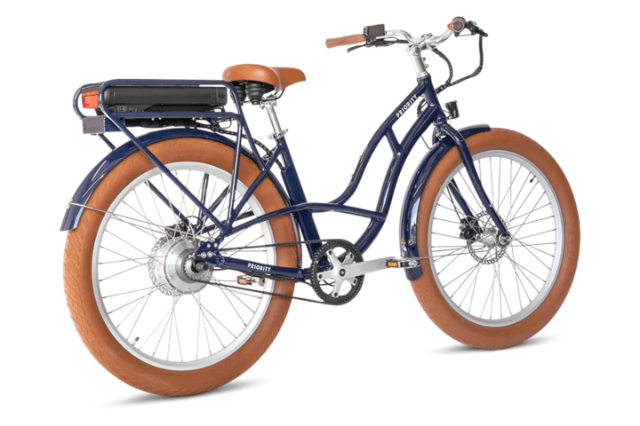 a bicycle leaning against a wall