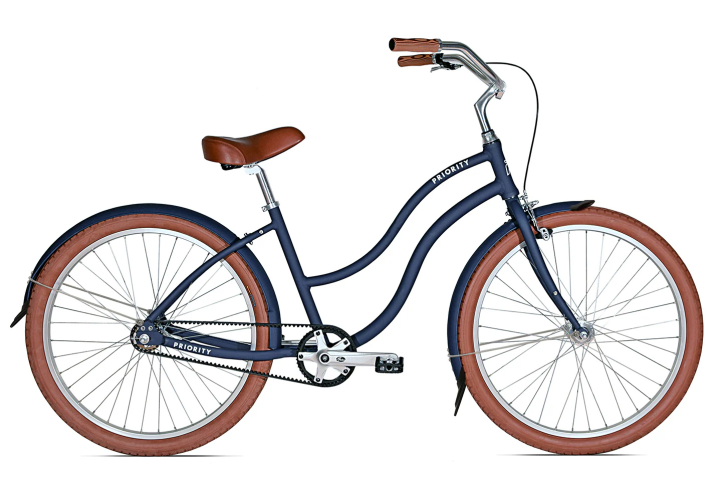 a bicycle leaning against a wall